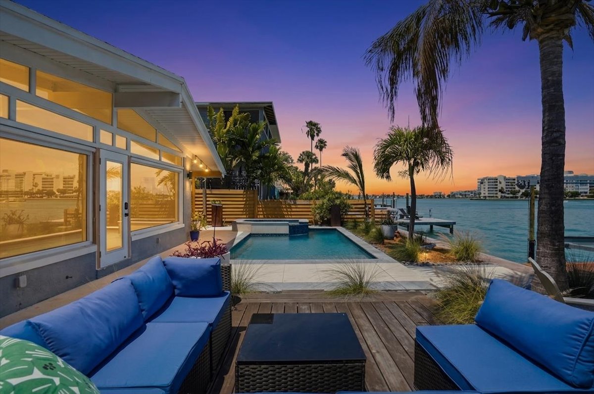 Beach and Bay Getaway pool and bay at sunset